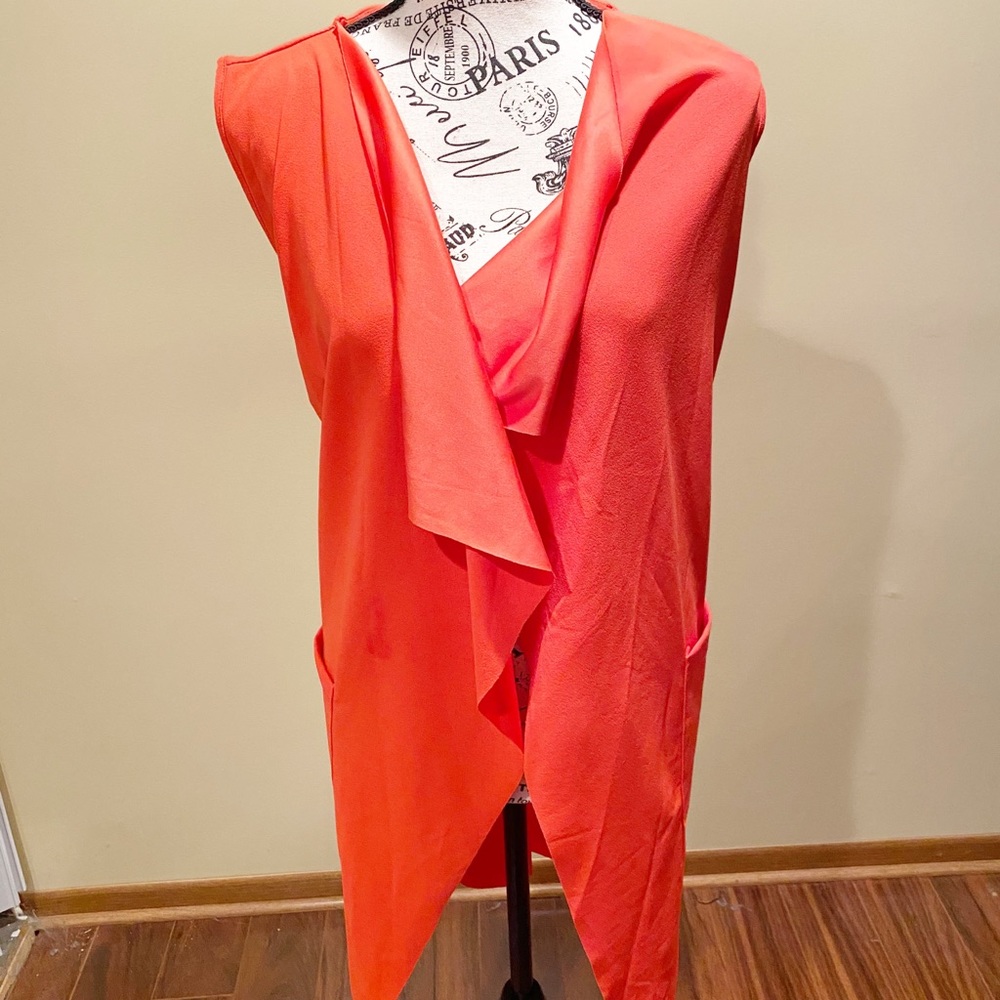 Woman’s Orange vest size medium
